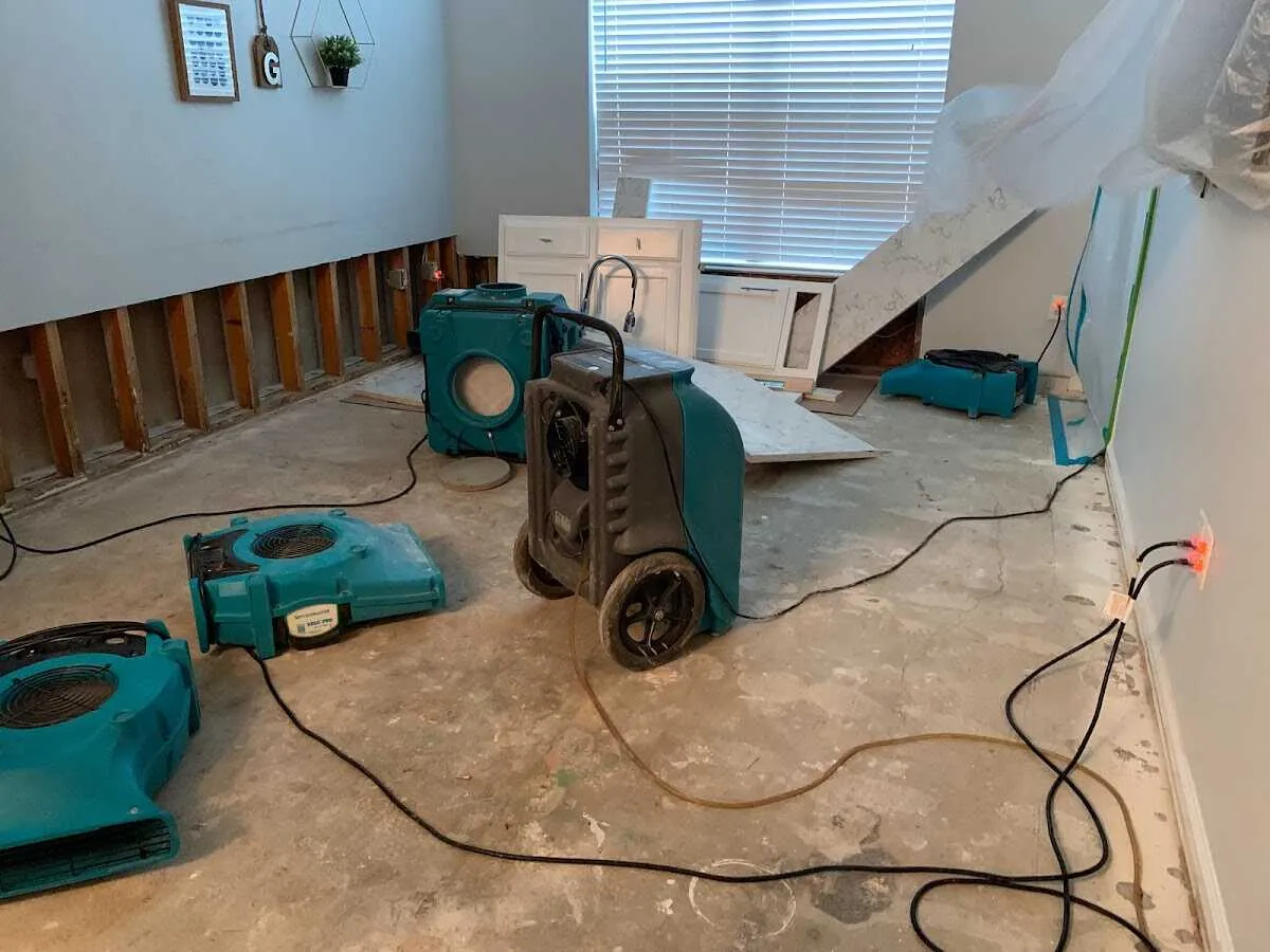 Dehumidifier in flood-cut room for Water Damage Restoration in Bay City